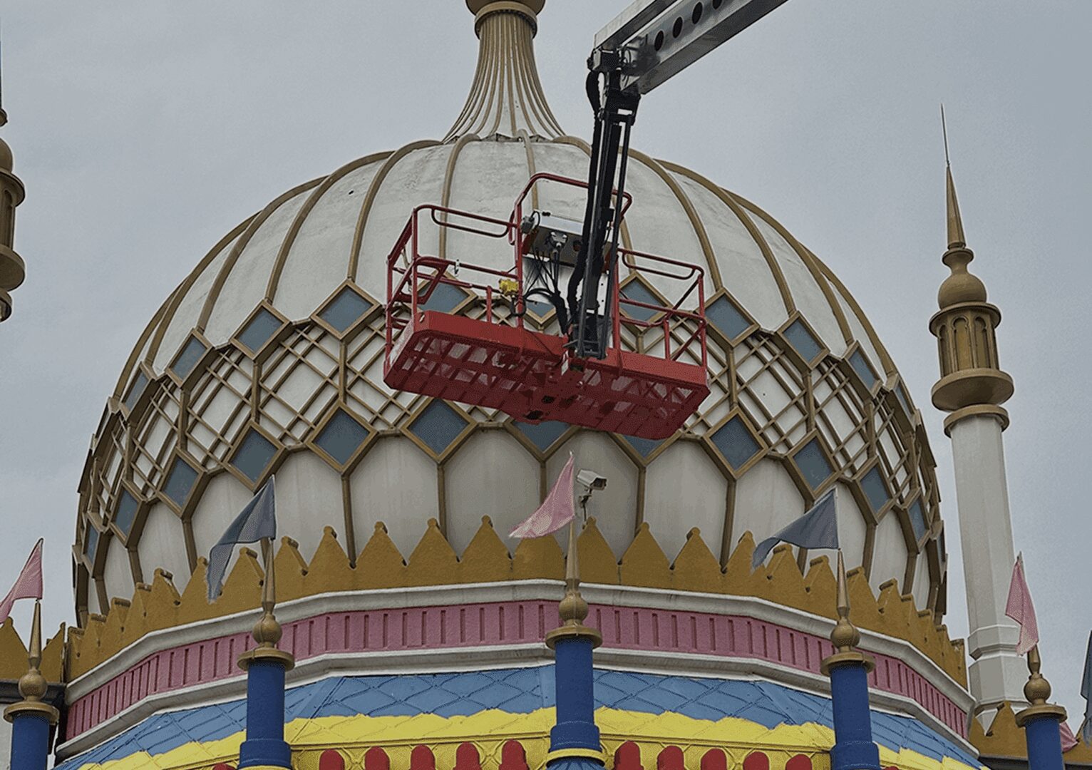Dome with crane lift and colorful details.