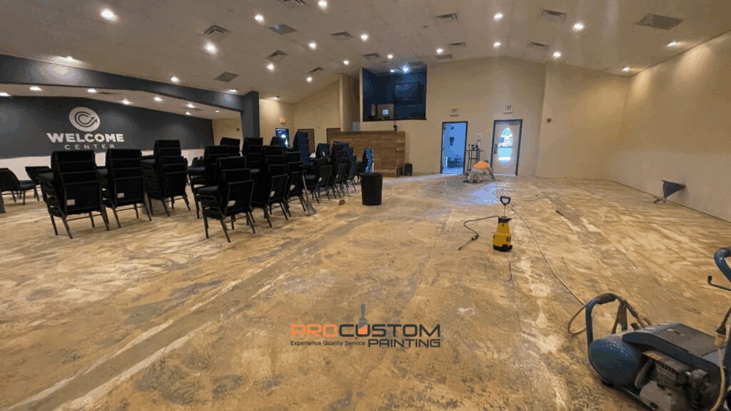 Room under renovation with chairs and equipment.
